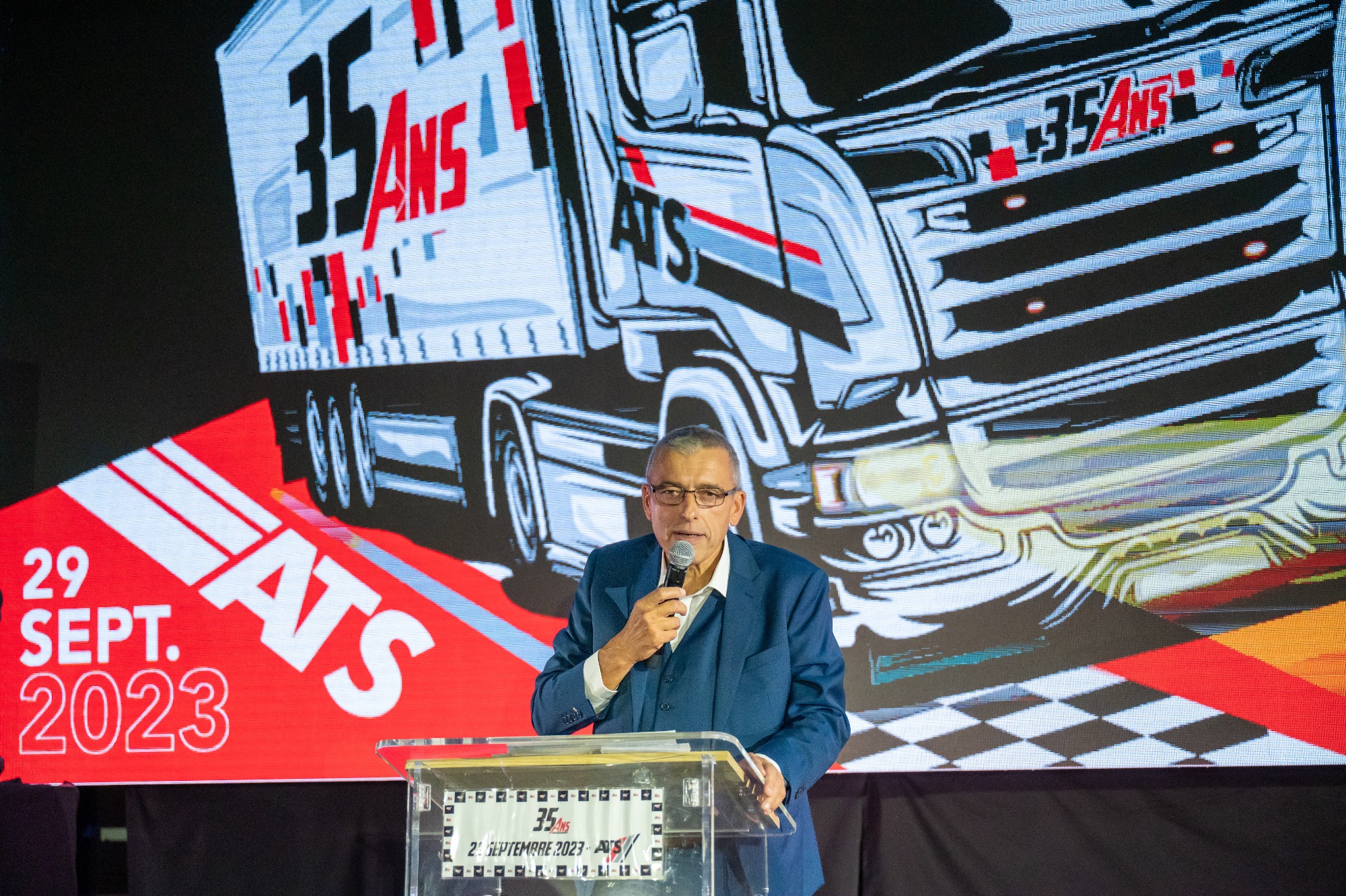Photographe professionnel Eric Denisot lors d'un événement d'entreprise à Saône.